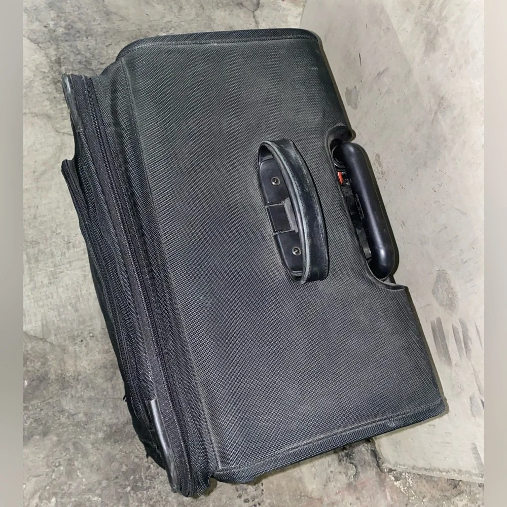 TUMI Check On Suitcase